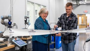 A photo of UMaine President Joan Ferinni-Mundy and Jared Golden